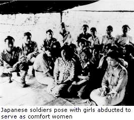 Japanese soldiers pose with girls abducted to serve as comfort women