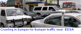 Crawling in bumper-to-bumper traffic near EDSA