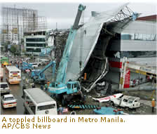 A toppled billboard in Metro Manila. Typhoon Milenio
