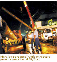 Meralco personnel work to restore power soon after. Typhoon Milenio