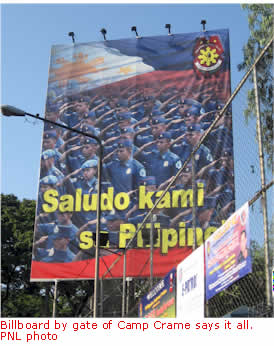 Billboard by gate of Camp Crame says it all. philnews.com photo