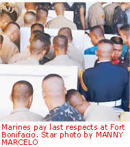 Marines pay last respects at Fort Bonifacio. Star photo by MANNY MARCELO