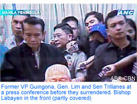 Former VP Guingona, Gen. Lim and Sen Trillanes at a press conference before they surrendered. Bishop Labayen in the front (partly covered) 