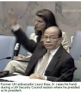 Former UN ambassador Lauro Baja, Jr. raises his hand during a UN Security Council session where he presided as its president. 