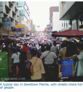 A typical day in downtown Manila, with streets chock-full of people.