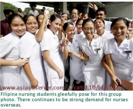 Filipina nursing students gleefully pose for this group photo. There continues to be strong demand for nurses  overseas.