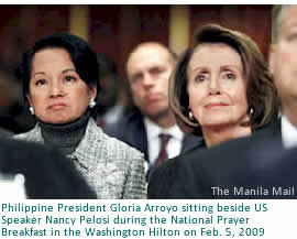Philippine President Gloria Arroyo sitting beside US Speaker Nancy Pelosi during the National Prayer Breakfast in the Washington Hilton on Feb. 5, 2009