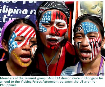 Members of the feminist group GABRIELA demonstrate in Olongapo for an end to the Visiting Forces Agreement between the US and the Philippines