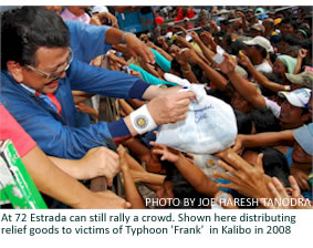 At 72 Estrada can still rally a crowd. Shown here distributing relief goods to victims of Typhoon 'Frank'  in Kalibo in 2008