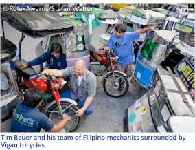 Tim Bauer and his team of Filipino mechanics surrounded by Vigan tricycles