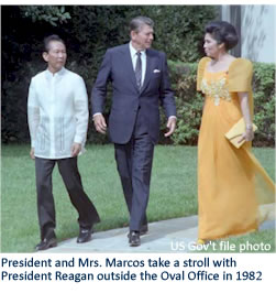 President and Mrs. Marcos take a stroll with President Reagan outside the Oval Office in 1982