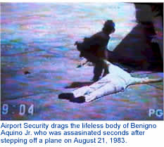 Airport Security drag the lifeless body of Benigno Aquino Jr. after he was assasinated seconds after stepping of a plane on August 21, 1983