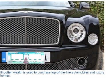 Ill-gotten wealth is used to purchase top-of-the-line automobiles and luxury homes