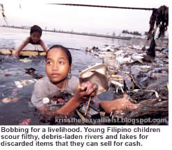 Bobbing for a livelyhood. Young Filipino children scower the debris-laden rivers and lakes for discarded items that can be sold for cash