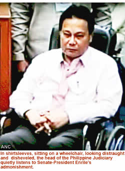 In shirtsleeves, seating on a wheelchair, looking distraught and  disheveled, the head of the Philippine Judiciary quietly listens to Senate-President Enrile's  admonishment