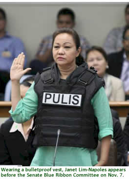 Wearing a bulletproof vest, Janet Lim-Napoles appears before the Senate Blue Ribbon Committee on Nov. 7.