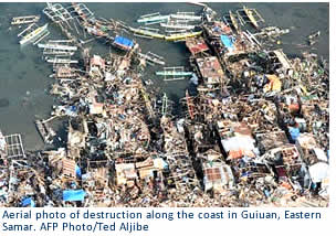 Aerial photo of destruction along the coast in Guiuan, Eastern Samar. AFP Photo/Ted Aljibe