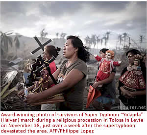 Award-winning photograph of survivors of Yolanda (Haiyan) march during a religious procession in Tolosa in Leyte on November 18, just over a week after the supertyphoon devastated the area. AFP/Philippe Lopez