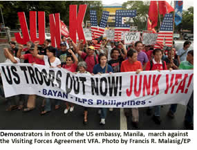 Demonstrators in front of the US embassy, Manila,  march against the Visiting Forces Agreement VFA. Photo by Francis R. Malasig/EP