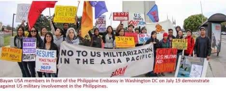 Bayan USA members in front of the Philippine Embassy in Washington DC on July 19 demonstrate against US military involvement in the Philippines