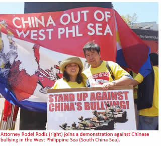 Attorney Rodel Rodis (right) joins a demonstration against Chinese bullying in the West Philippine Sea (South China Sea)