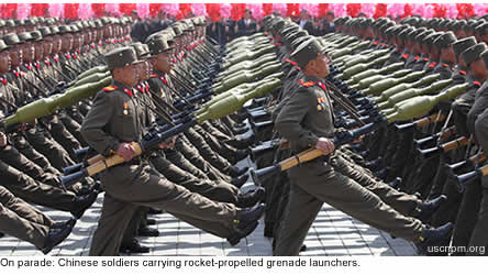 On parade: Chinese soldiers carrying rocket-propelled grenade launchers