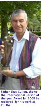 Father Shay Cullen, shows the International Person of the year Award for 2008 he received  for his work at PREDA
