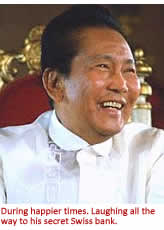During happier times. Laughing all the way to his secret Swiss bank